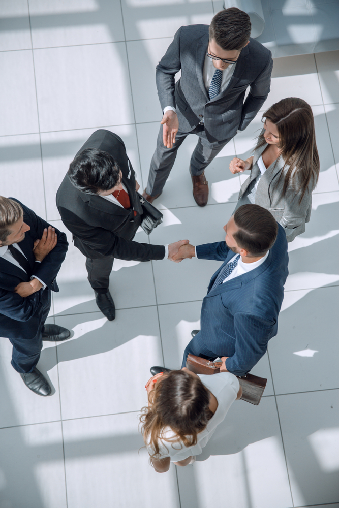 Employees greeting eachother